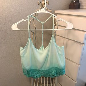 Blue/green crop top with scalloped bottom